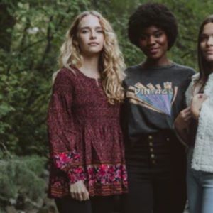 Piper & Scoot Ronnie patterned peplum blouse in maroon. Size: S